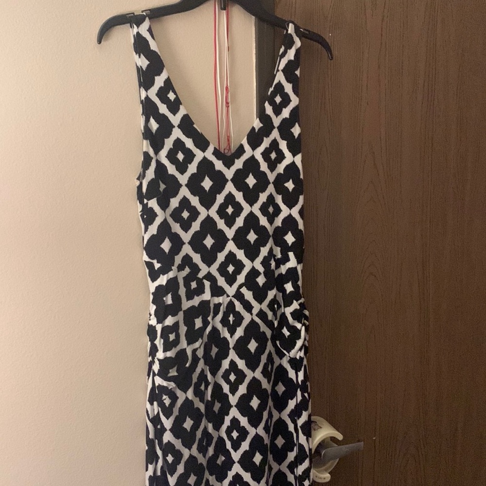 INC long black and white dress. Very form fitting. Shows off the curves.